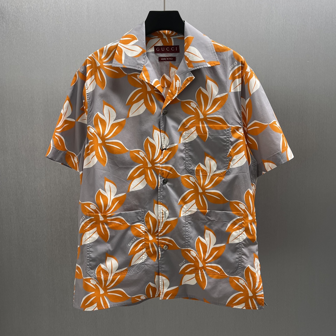 🧧GG Camisa corta de hibisco naranja Talla: S-XL En la colección Primavera-Verano 2025, las camisas presentan un diseño…