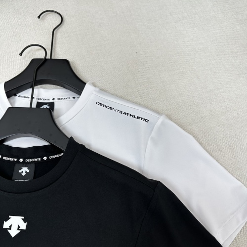 Descente Athletic T-Shirt: Polartec Fabric, Moisture-Wicking, Stylish Design 1 Descente Athletic T-Shirt: Polartec Fabric, Moisture-Wicking, Stylish Design