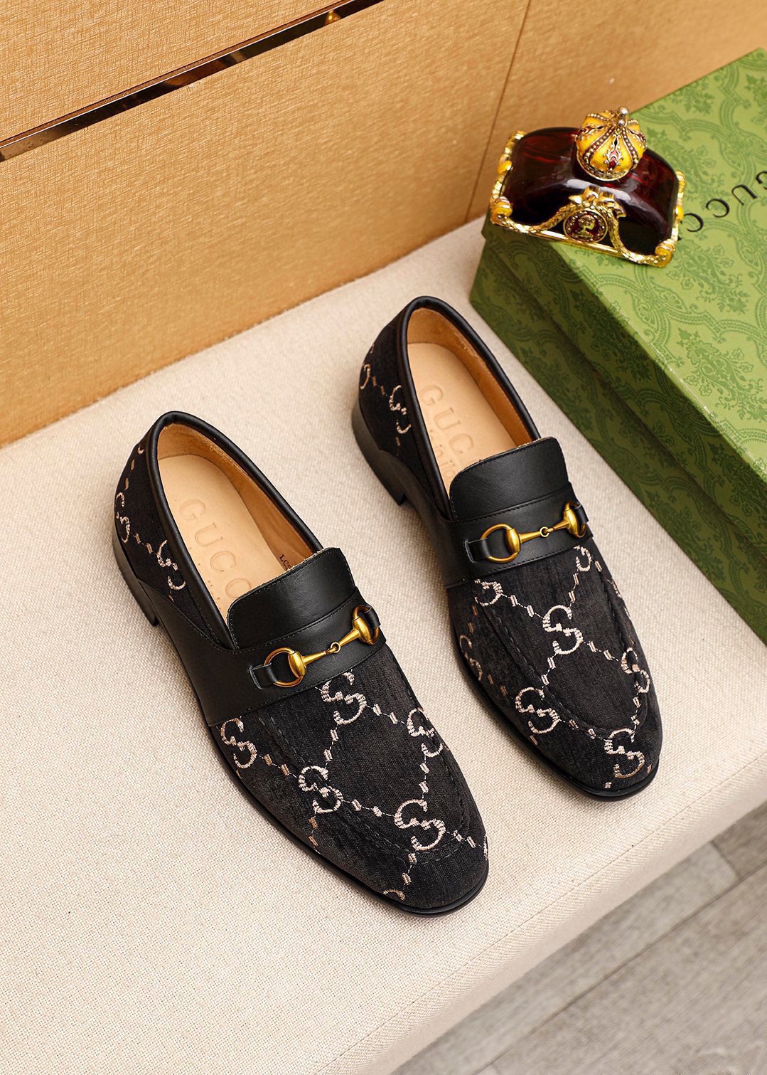 Gucci Men's Black Leather Loafers with Iconic GG Pattern and Gold Hardware
