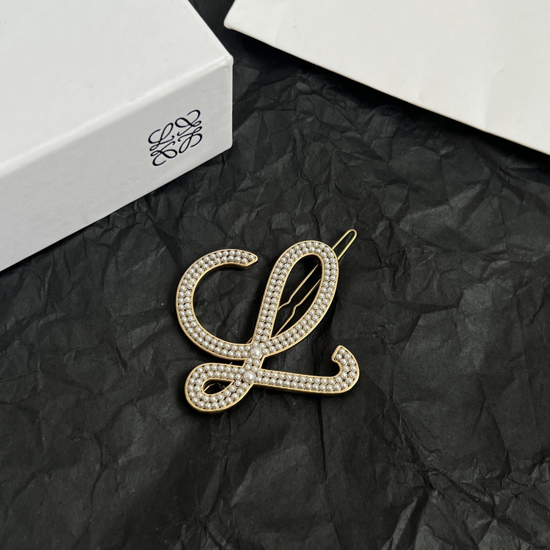 “188 Loewe Z-Bronze Hairpins: Perfectly Carved Detail for Versatile Wear” - 图片 2