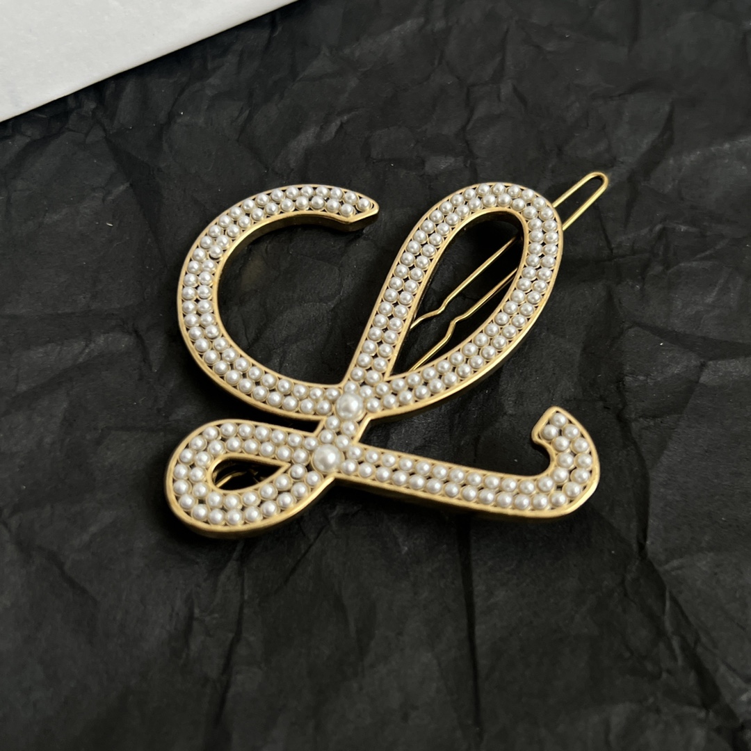 “188 Loewe Z-Bronze Hairpins: Perfectly Carved Detail for Versatile Wear” - 图片 4