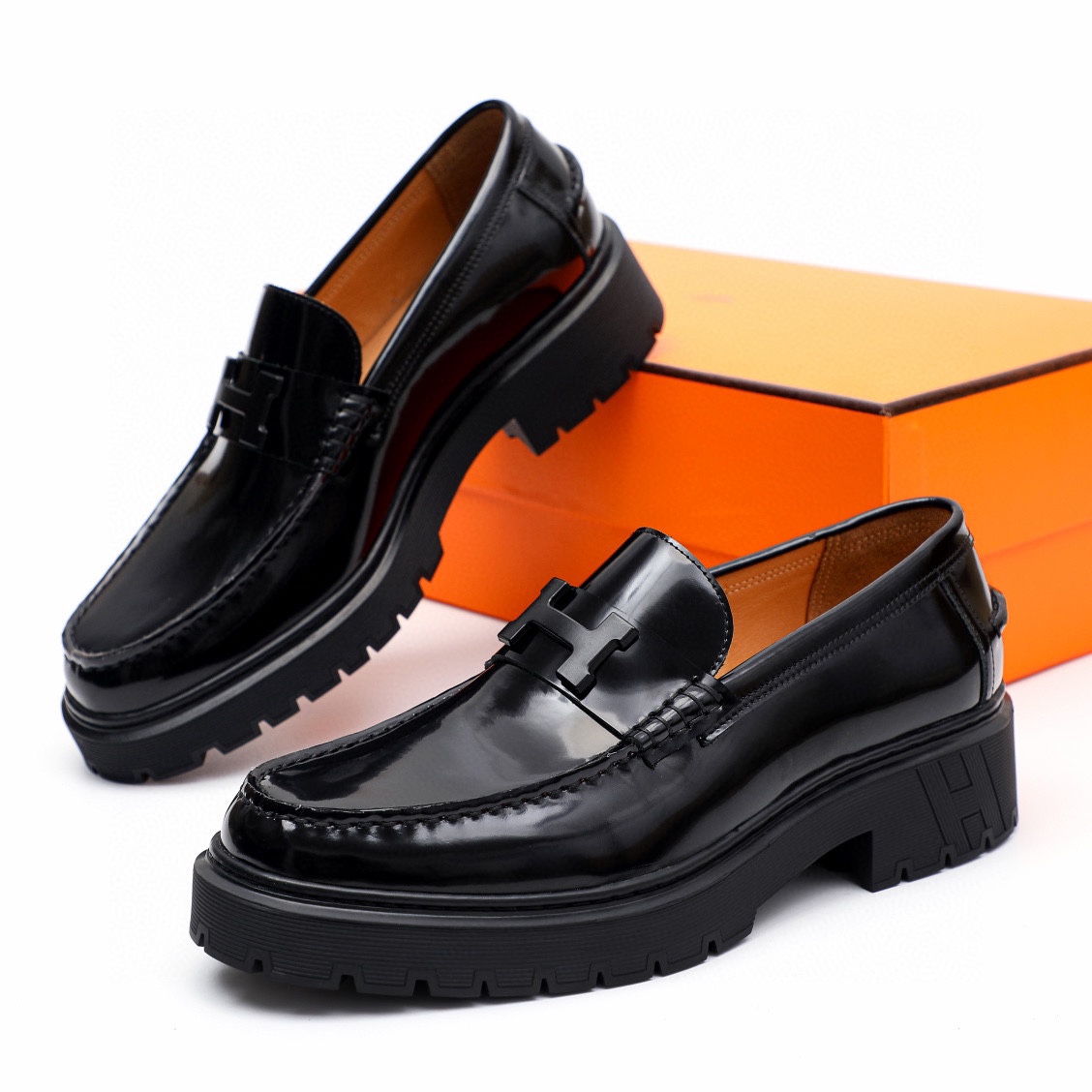 Hermès Men's Black Leather Mocassin Loafers with Golden Buckle Detail 3 i1744521367 2867 1