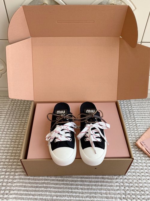 Miu Miu Retro Canvas Sneakers with Double Shoelaces - Comfortable & Stylish 1 Miu Miu Retro Canvas Sneakers with Double Shoelaces - Comfortable & Stylish