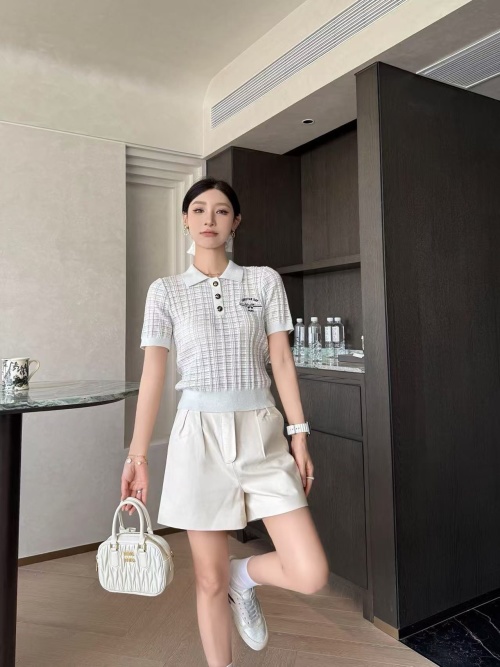 Christian Dior Paris Knitted Polo Shirt - French Chic, Retro Button Design 1 Christian Dior Paris Knitted Polo Shirt – French Chic, Retro Button Design