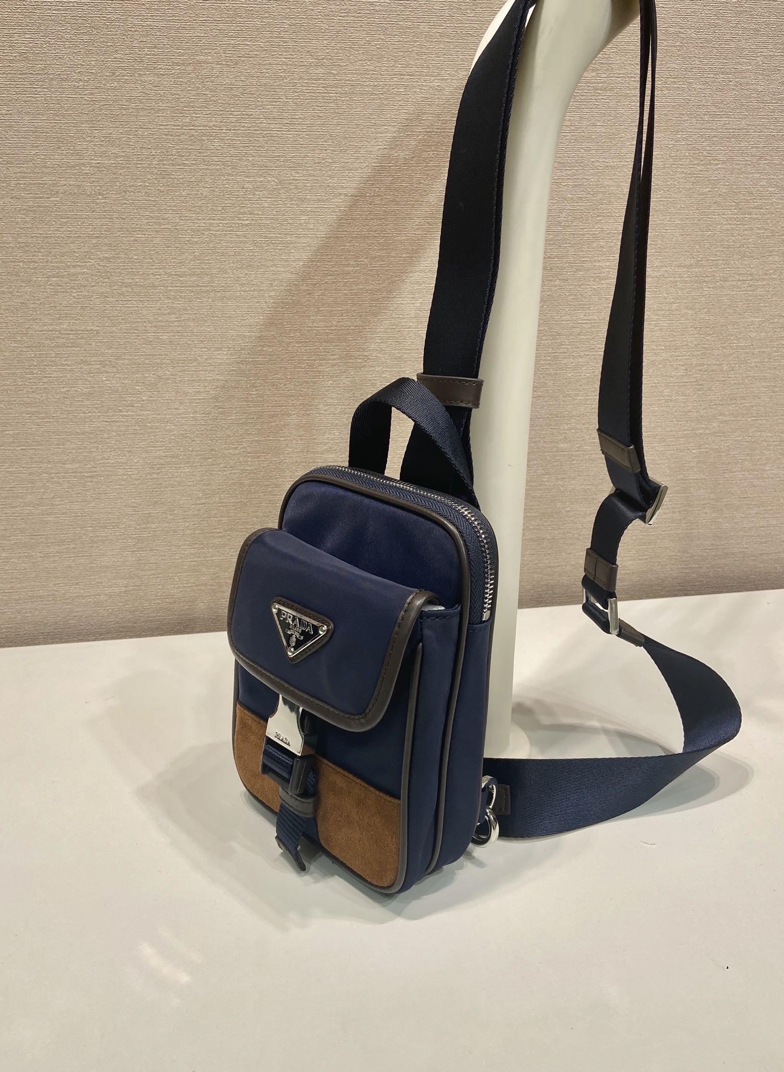 Stylish Black Nylon & Saffiano Leather Phone Pouch with Triangle Logo 4 i1745742325 1523 2