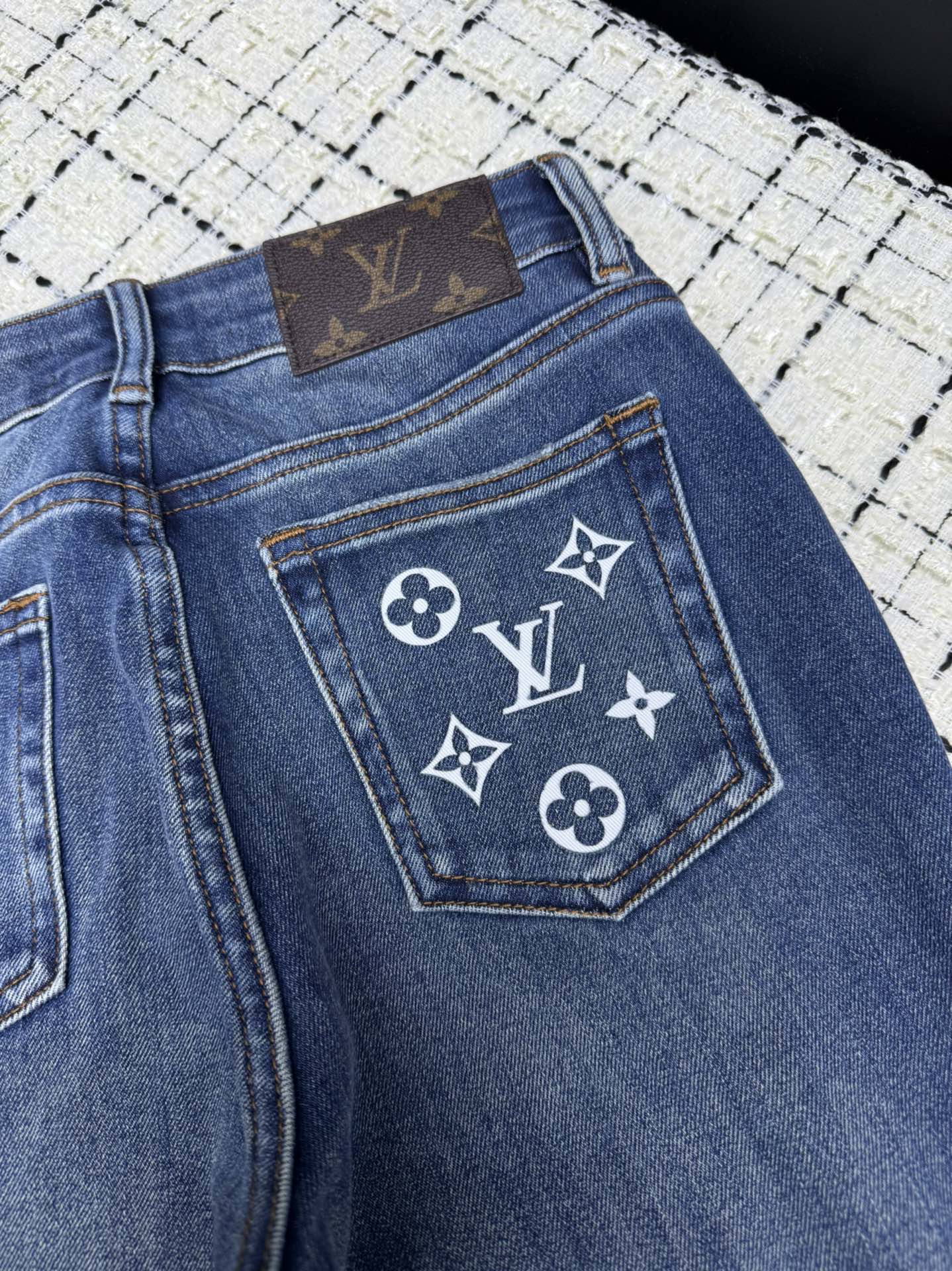 louis vuitton monogram embroidered flared jeans