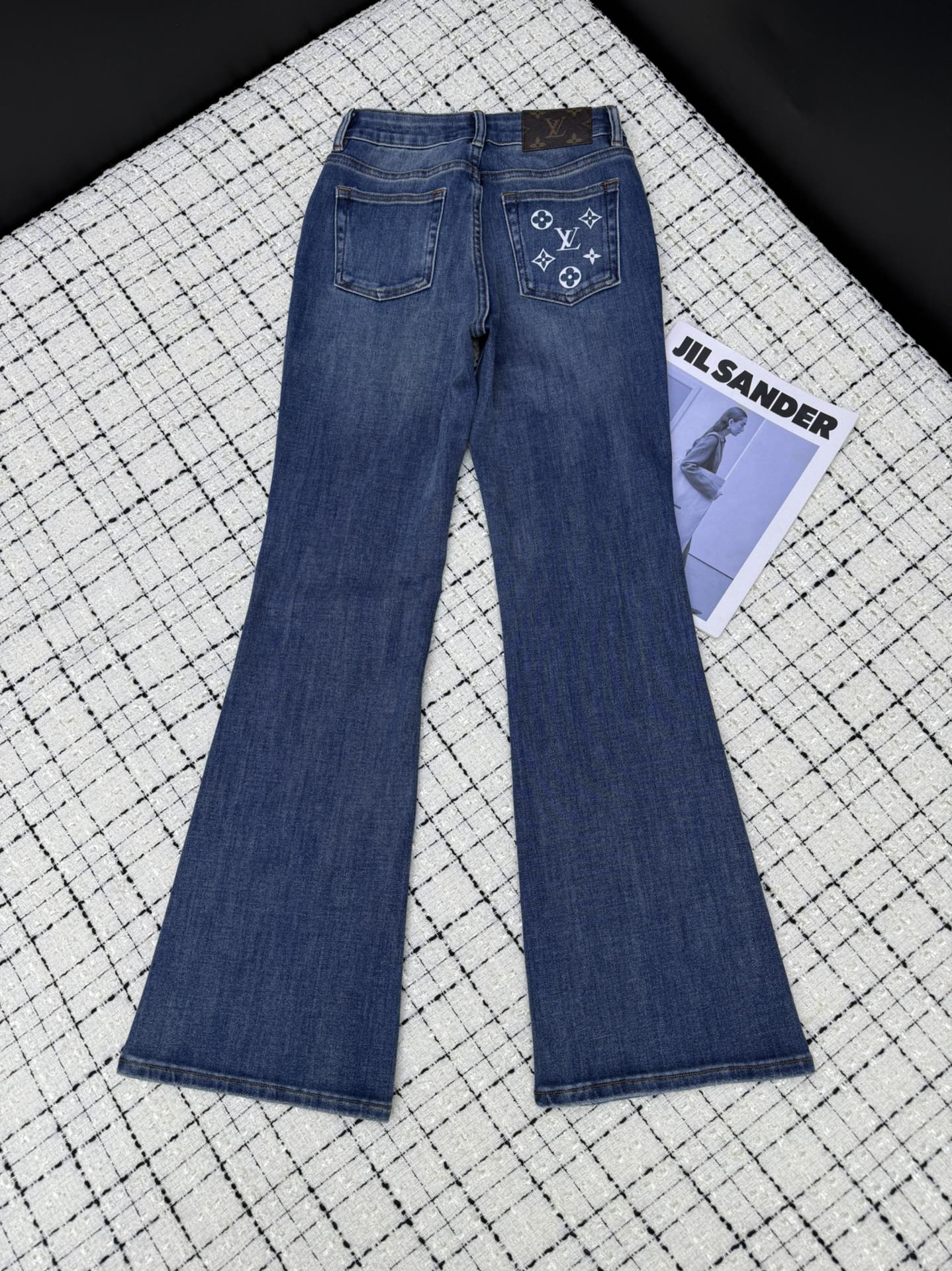 louis vuitton monogram embroidered flared jeans