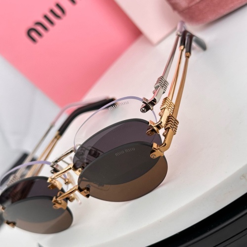 Miu Miu SMUA54S Rimless Oval Sunglasses | Gold and Silver Tone Hardware 1 Miu Miu SMUA54S Rimless Oval Sunglasses | Gold and Silver Tone Hardware