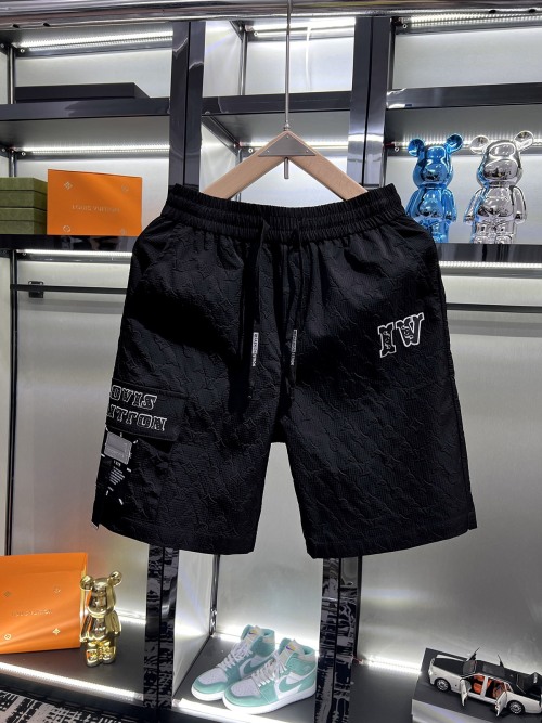 Louis Vuitton Men's Black Shorts with Embossed Logo and Cargo Pocket 1 Louis Vuitton Men's Black Shorts with Embossed Logo and Cargo Pocket
