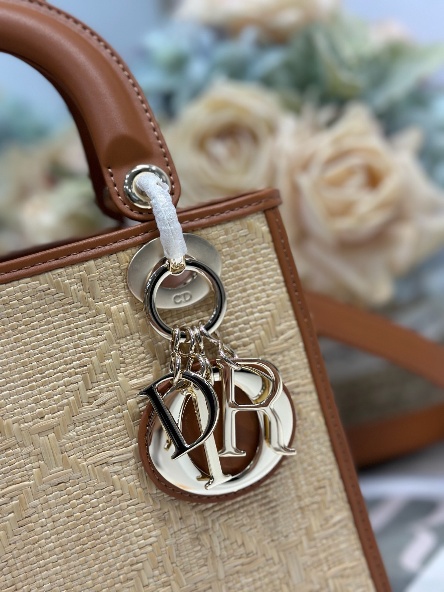 Lady Dior Raffia Mini Bag with Iconic Cannage Stitching and D.I.O.R. Charm 5 i1747983847 3110 3