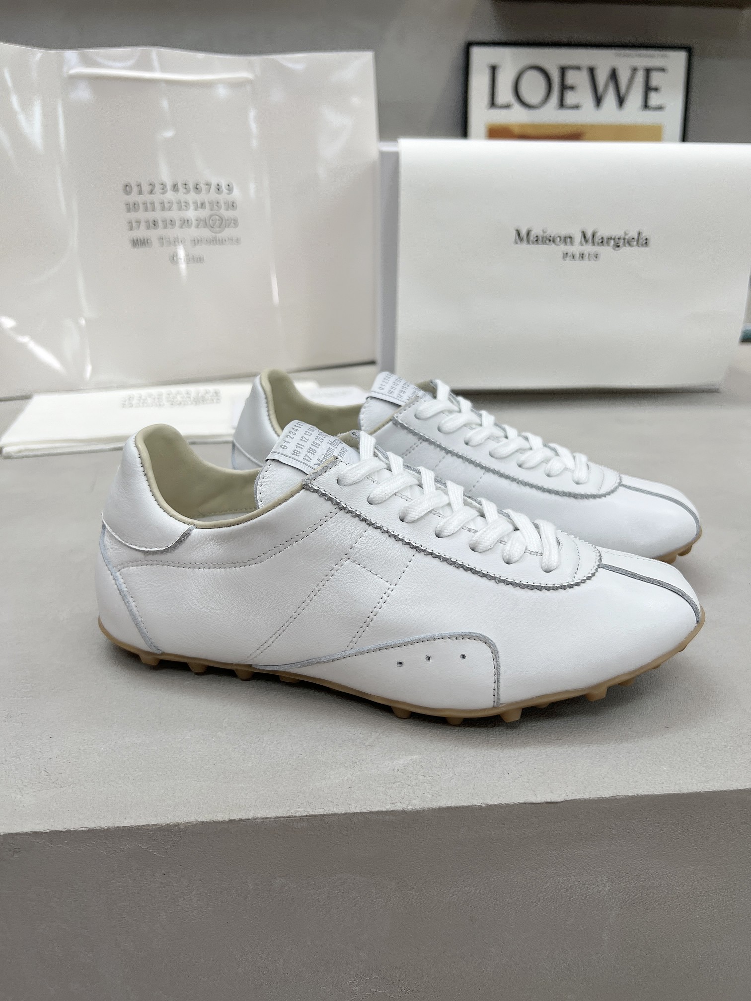 Maison Margiela White Leather Low-Top Sneakers - Comfortable and Stylish 3 a1749225586104 1567