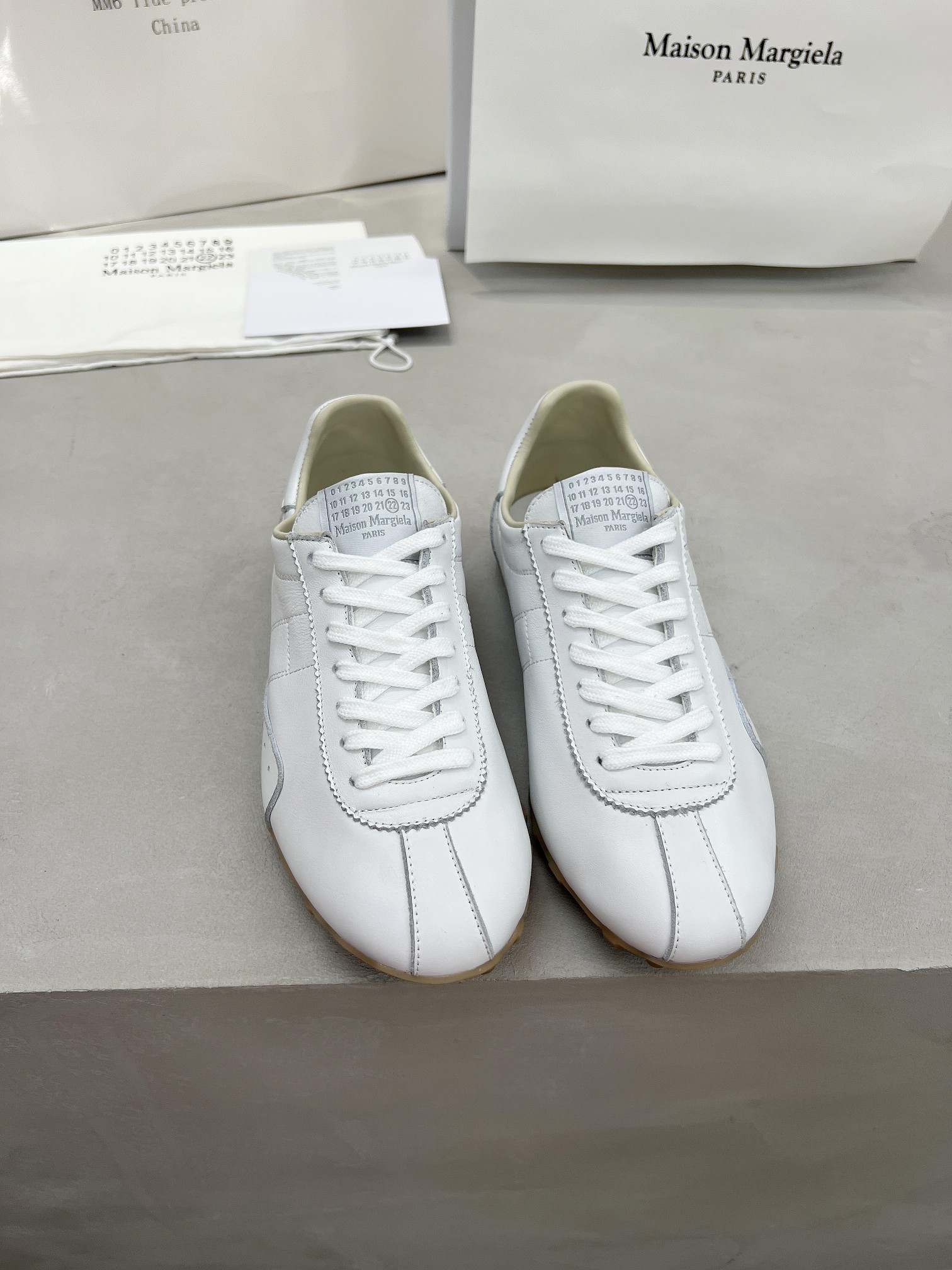 Maison Margiela White Leather Low-Top Sneakers - Comfortable and Stylish 4 a1749225586403 8604