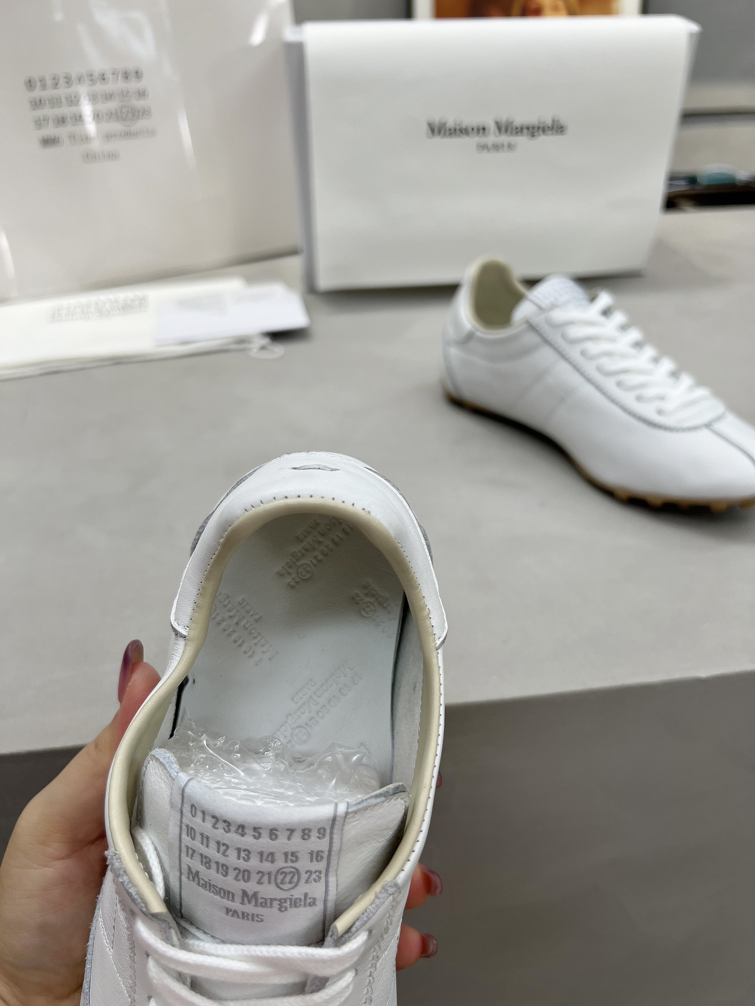 Maison Margiela White Leather Low-Top Sneakers - Comfortable and Stylish 8 a1749225587407 6531