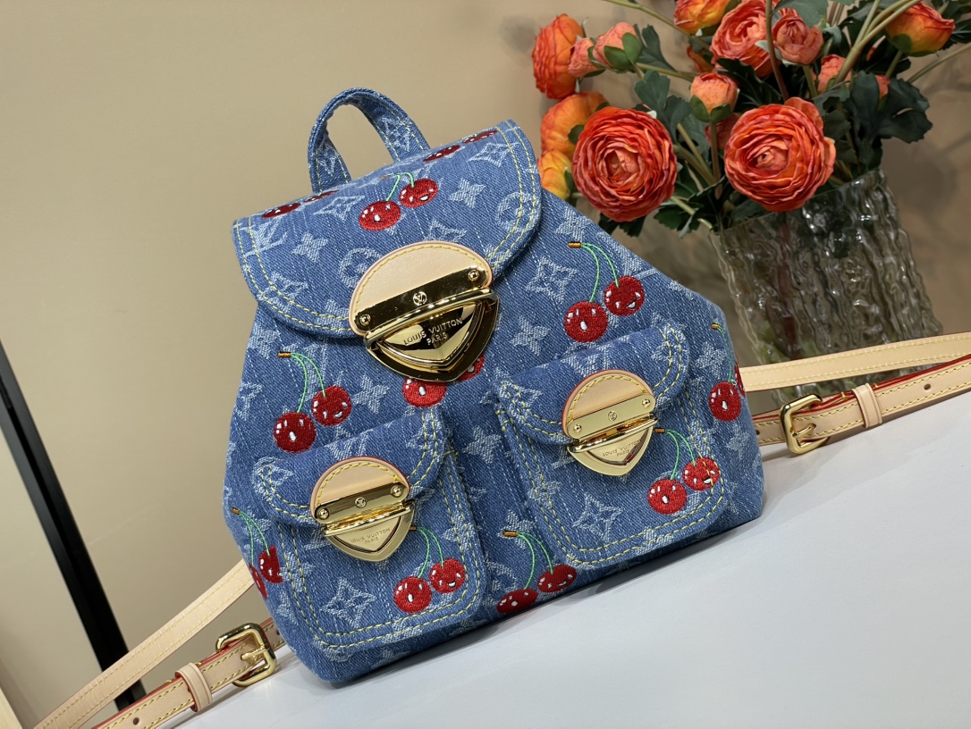 حقيبة ظهر Louis Vuitton Venice M13679 من الدنيم الأزرق والكرز