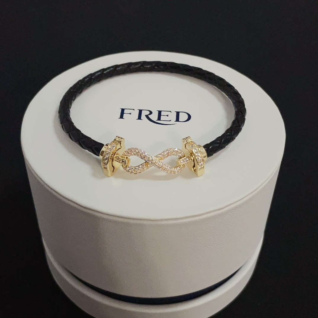 FRED Gouden Armband met Diamanten Infinity Symbool en Zwarte Leren Band