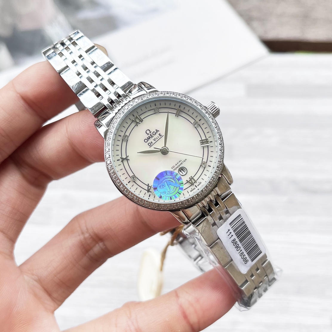 OMEGA De Ville Ladies Watch with Diamond Bezel and Stainless Steel Band