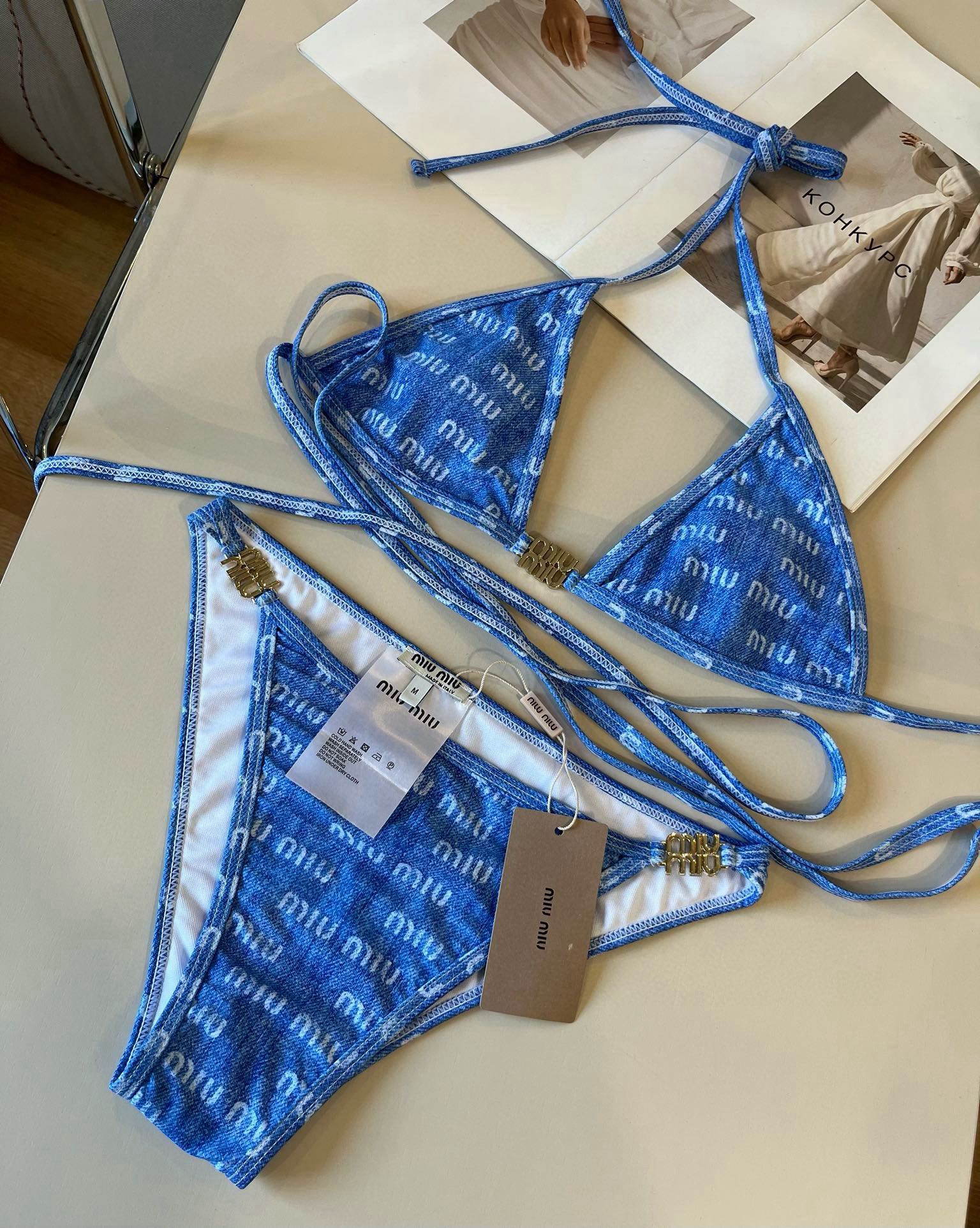  🆕 
miumiu缪缪新款比基尼😍🥰适合多种场景的游泳衣🏊‍♀️海边 游泳池 温泉 水上乐园 漂流都可
