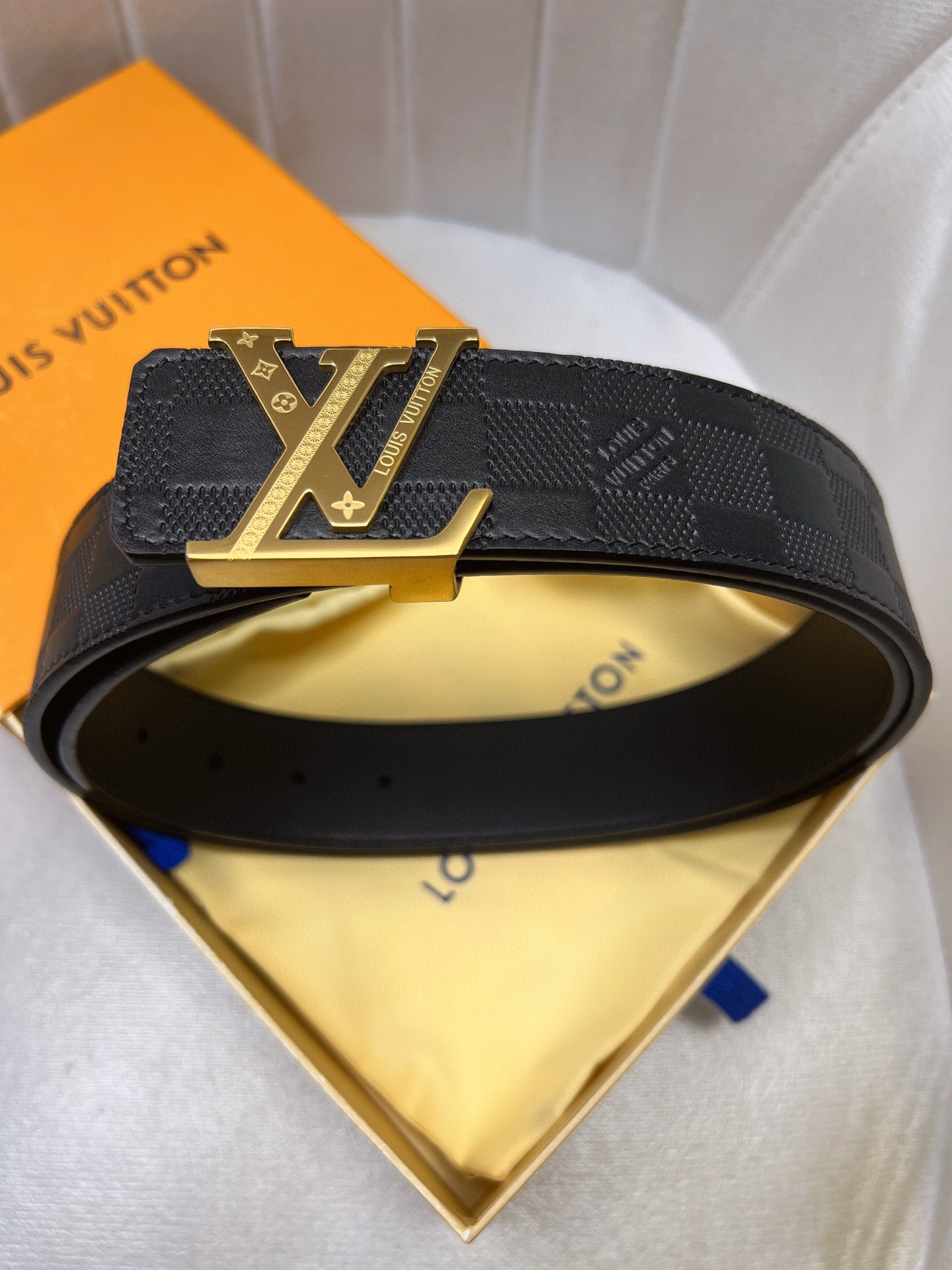 Luxury LV Belt with Gold Knitted Oxen-Skin Strips and Custom Leather Cabinet.