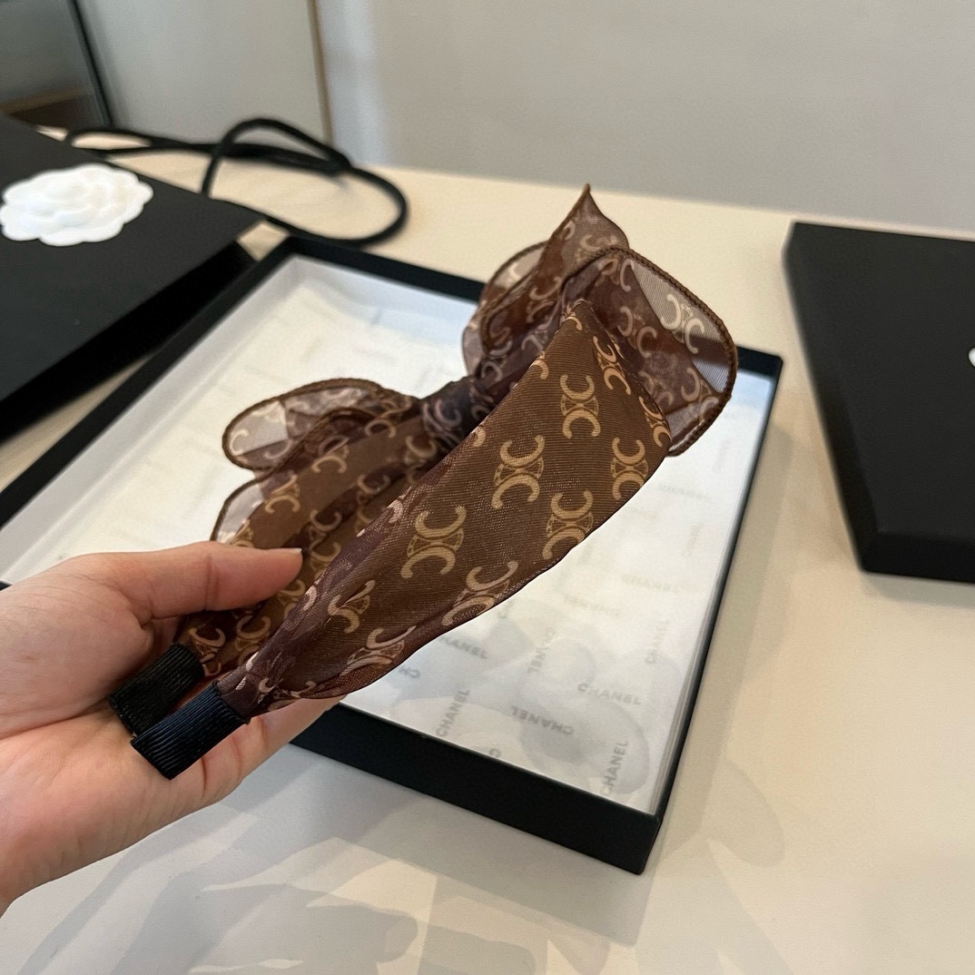 🆕
Celine赛琳蝴蝶结发圈