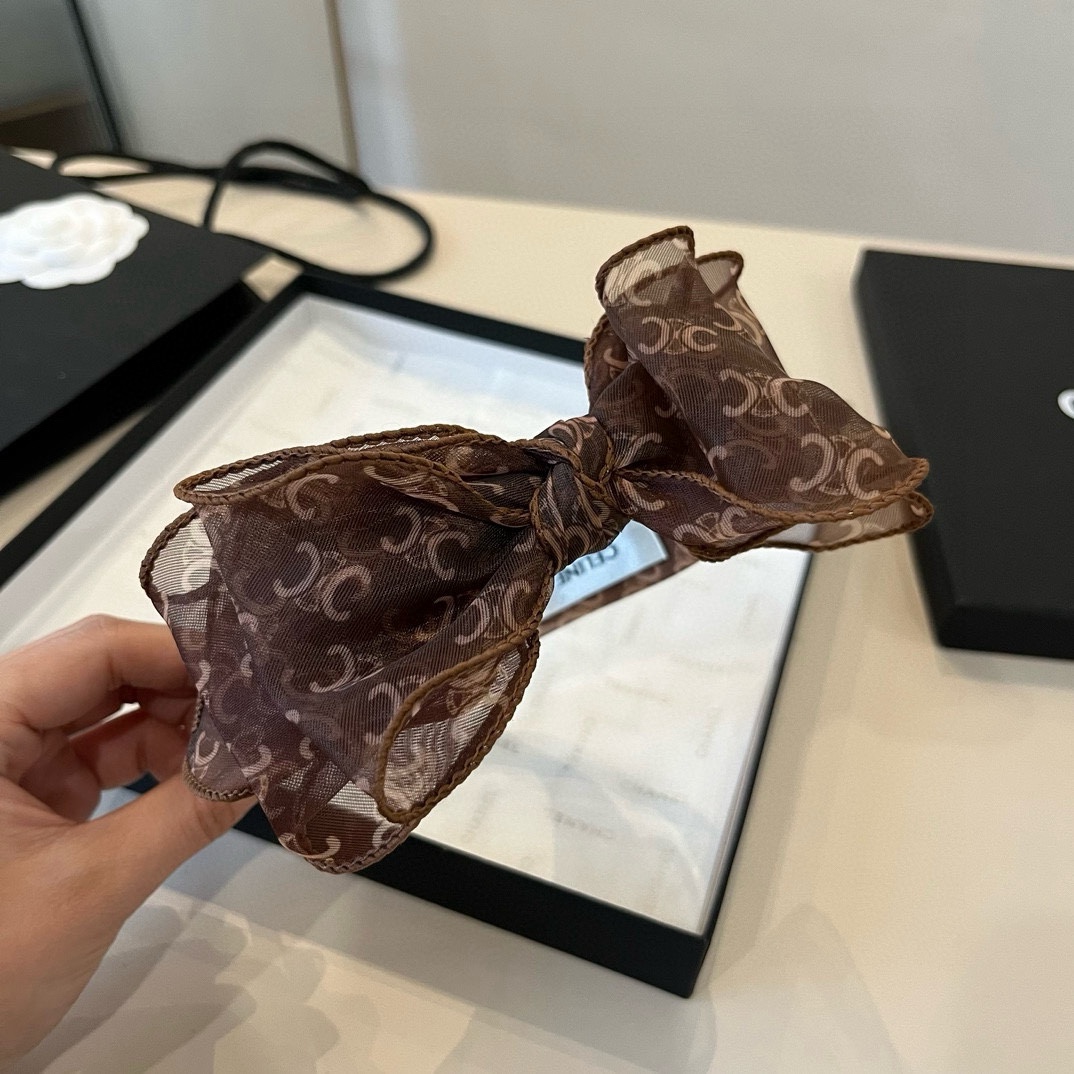 🆕
Celine赛琳蝴蝶结发圈