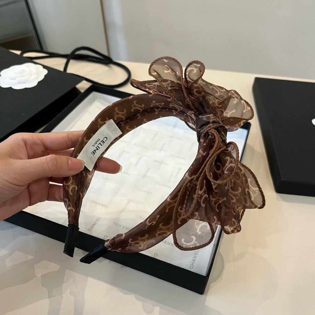 🆕
Celine赛琳蝴蝶结发圈