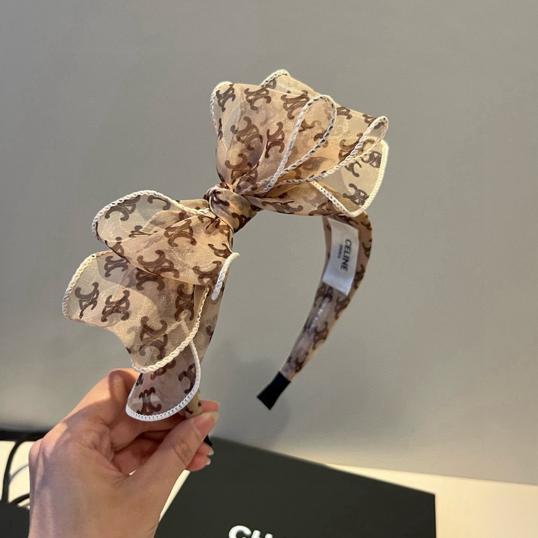 🆕

Celine赛琳蝴蝶结发圈
