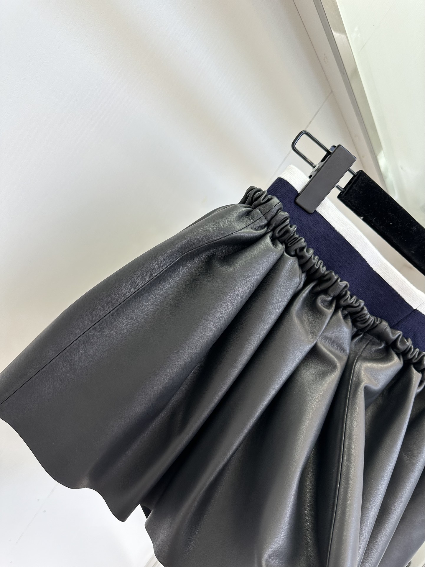 Miu Miu Nappa Leather Pleated Mini Skirt: Timeless Style & Flattering Fit 9 i1753606795 1006 7