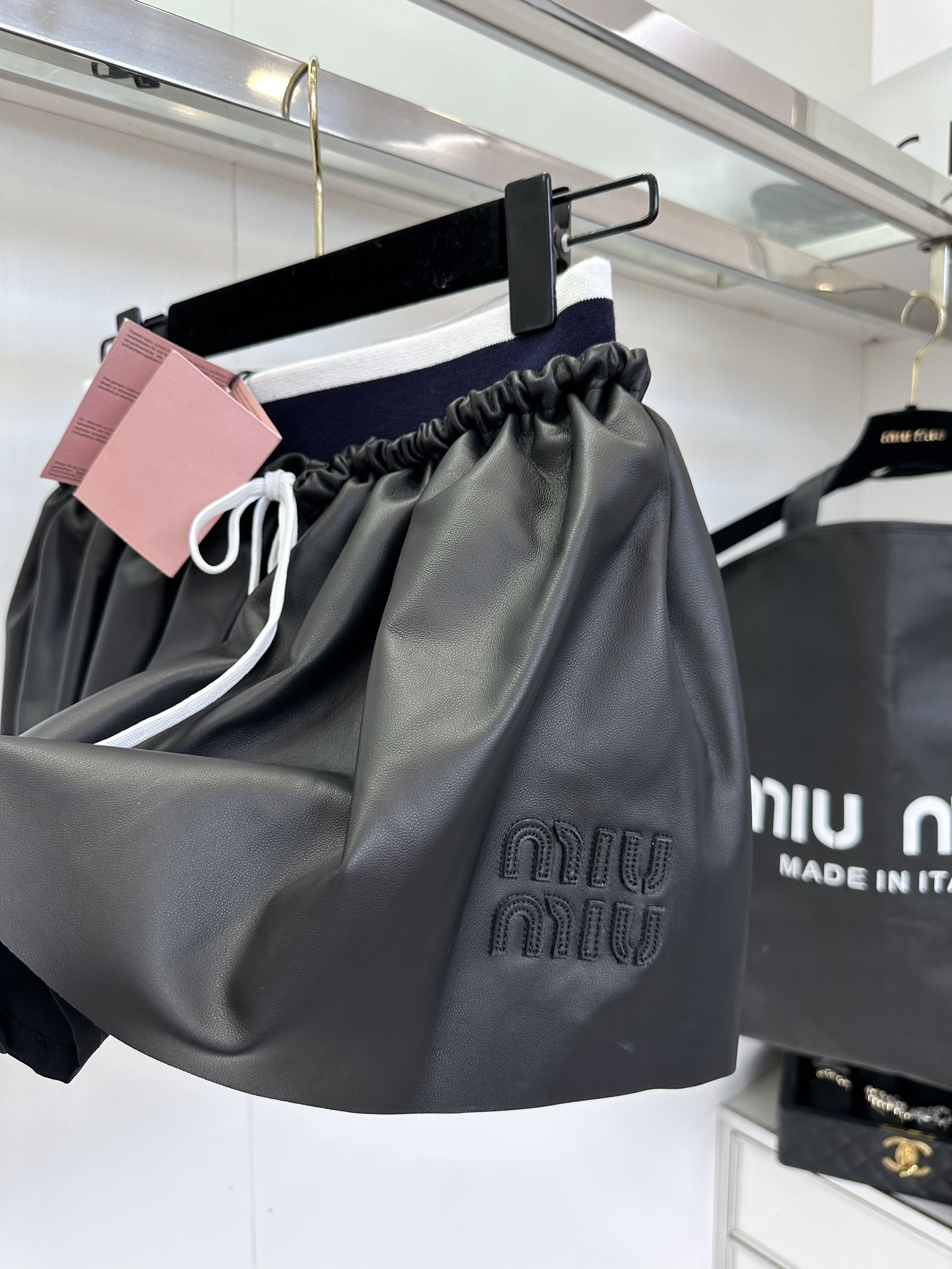 Miu Miu Nappa Leather Pleated Mini Skirt: Timeless Style & Flattering Fit 6 i1753606795 5961 4