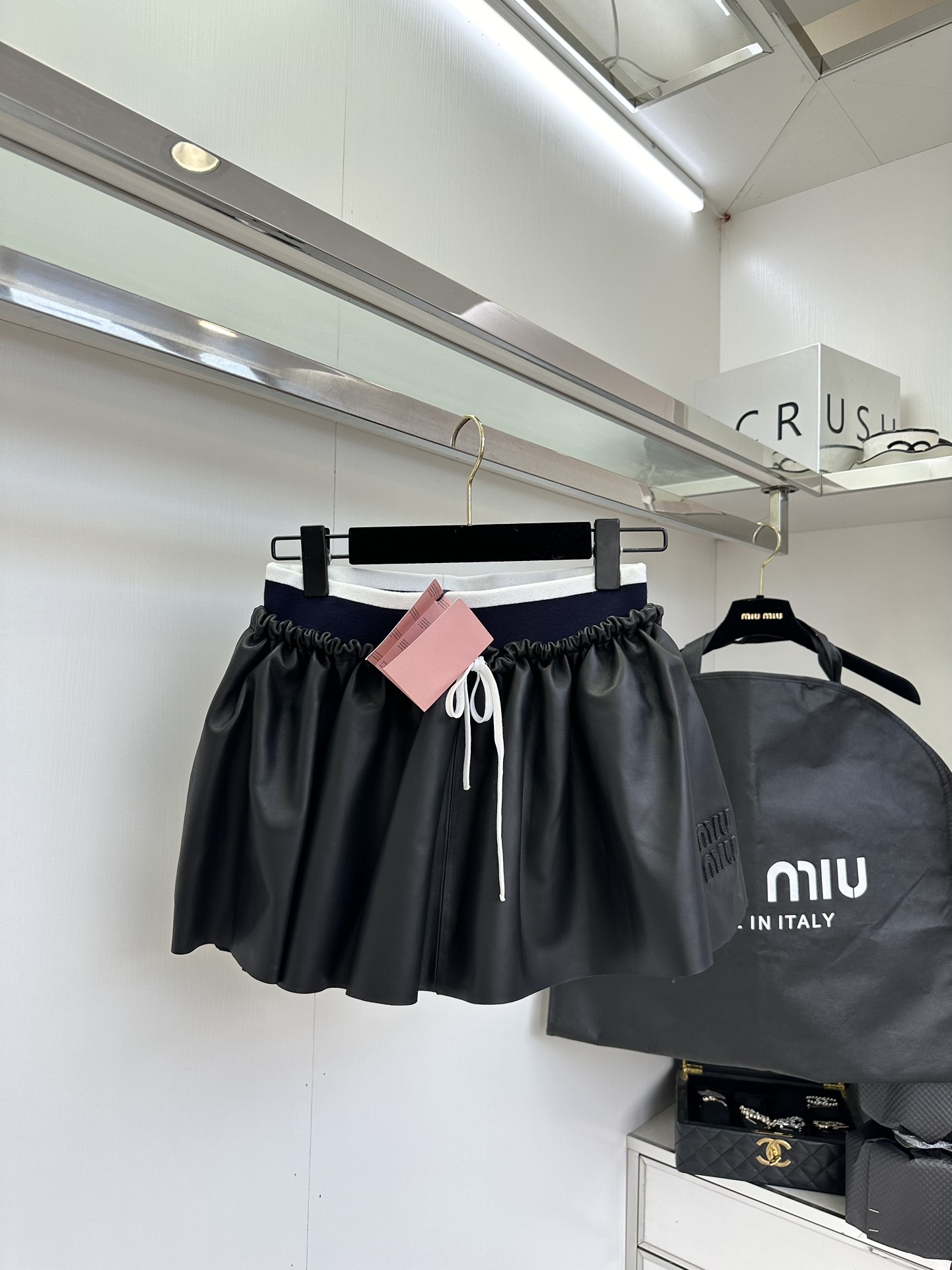 Miu Miu Nappa Leather Pleated Mini Skirt: Timeless Style & Flattering Fit 2 i1753606795 6193 0