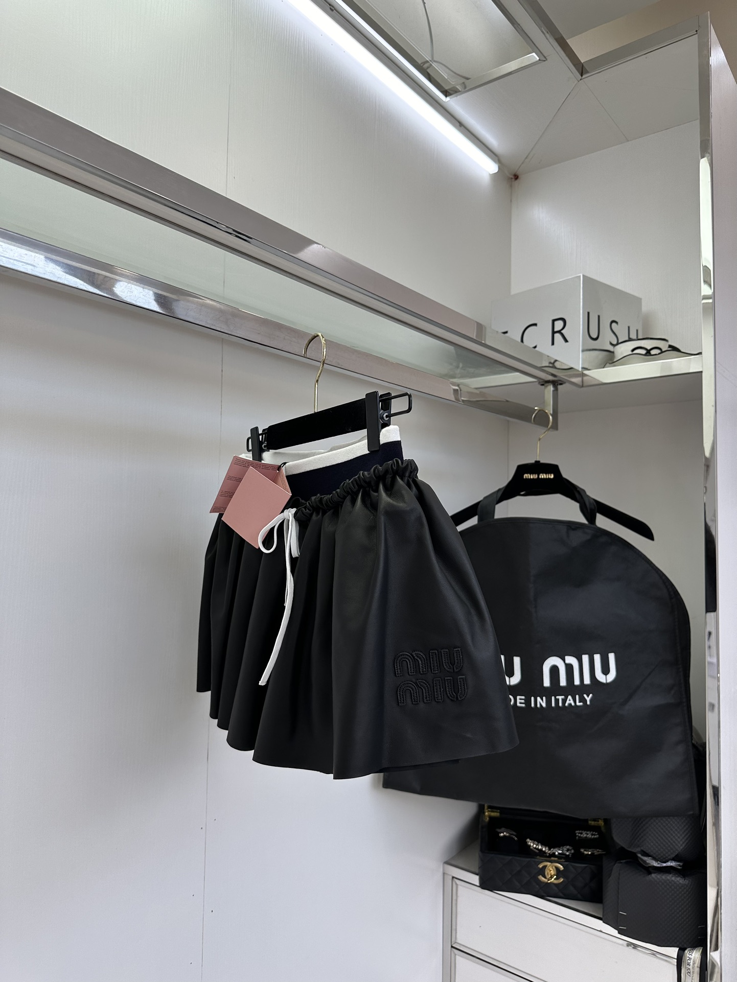 Miu Miu Nappa Leather Pleated Mini Skirt: Timeless Style & Flattering Fit 4 i1753606795 7677 2