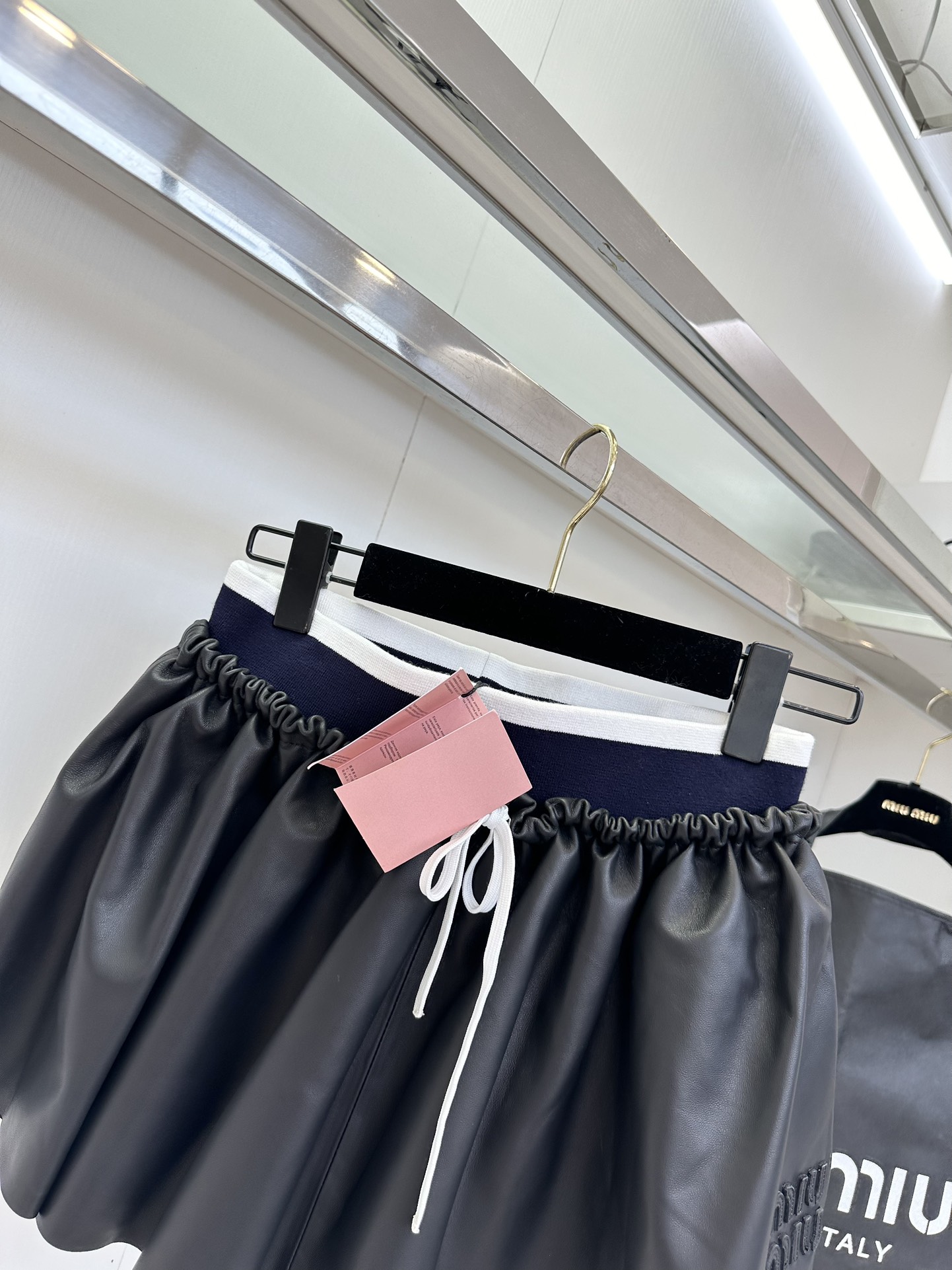 Miu Miu Nappa Leather Pleated Mini Skirt: Timeless Style & Flattering Fit 7 i1753606795 9885 5