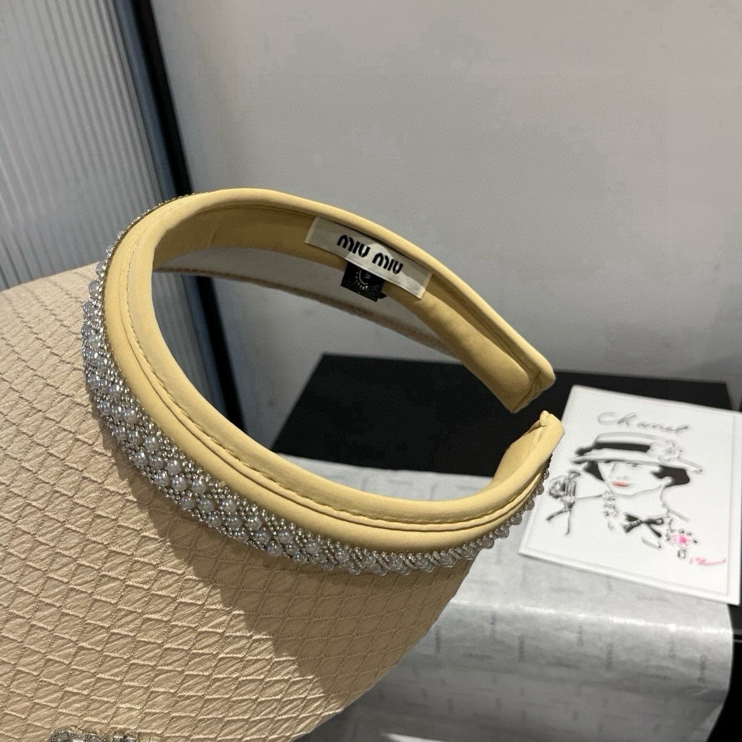 🆕

缪缪miumiu空顶发箍遮阳帽