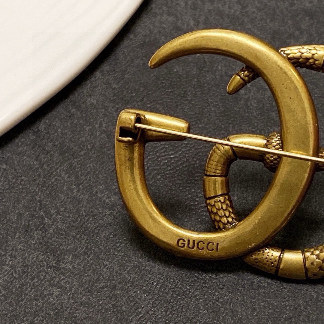 Gucci ダブルG 中古蛇古銅色胸针