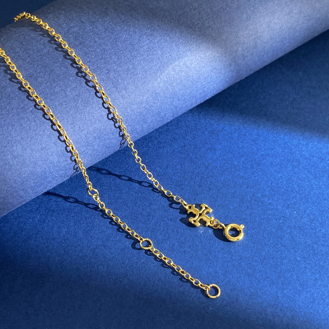 Tory Burch Tory Burch托里伯奇欧美 高级感轻奢镶钻圆形镂空双T字母圆圈吊坠项链 黄铜材料 金色 重约8
