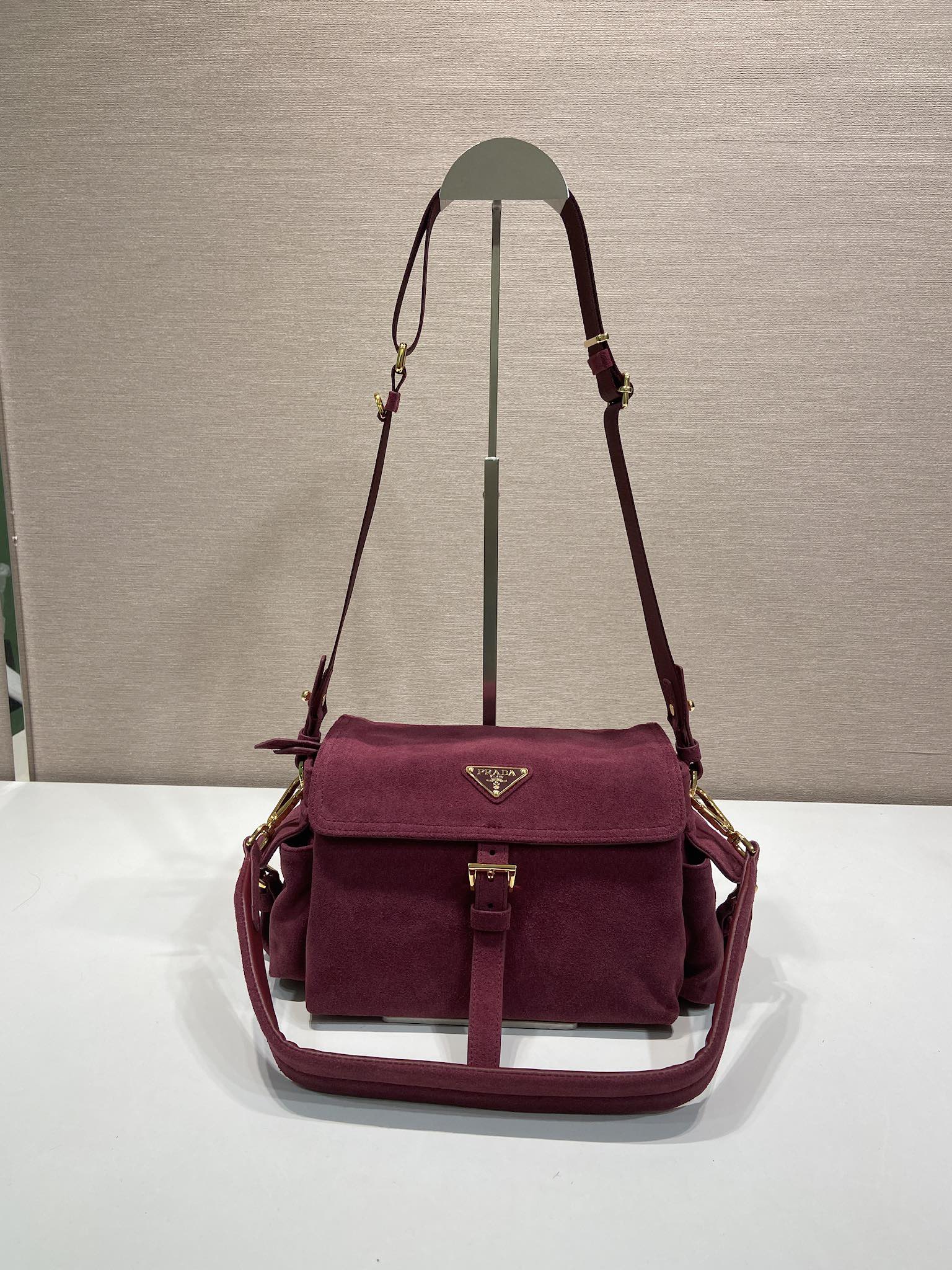 Prada Suede Messenger Bag with Flap Closure and Adjustable Straps