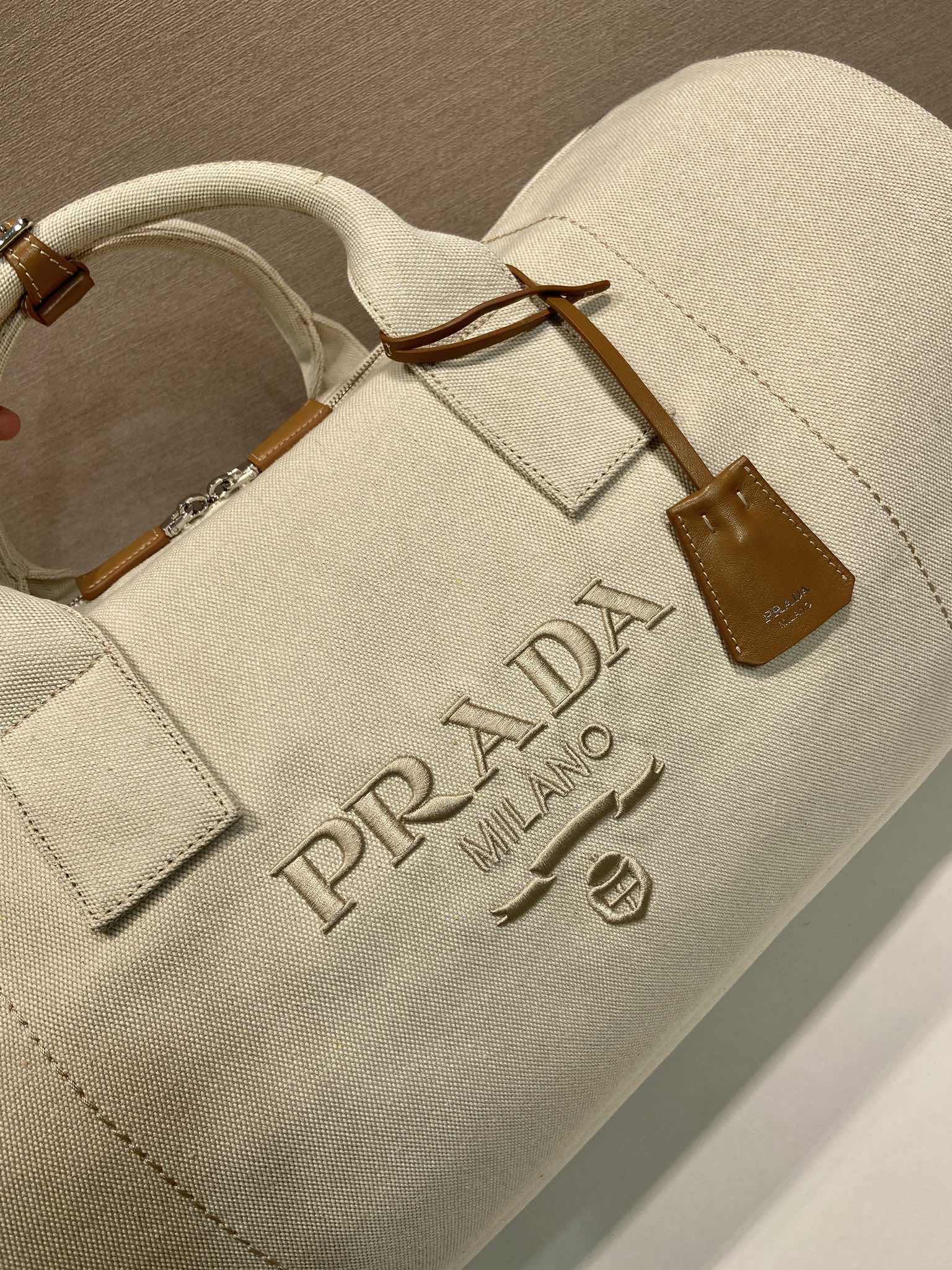 Prada Canvas Travel Bag with Leather Details - Spacious & Stylish 5 i1754633468 6443 4