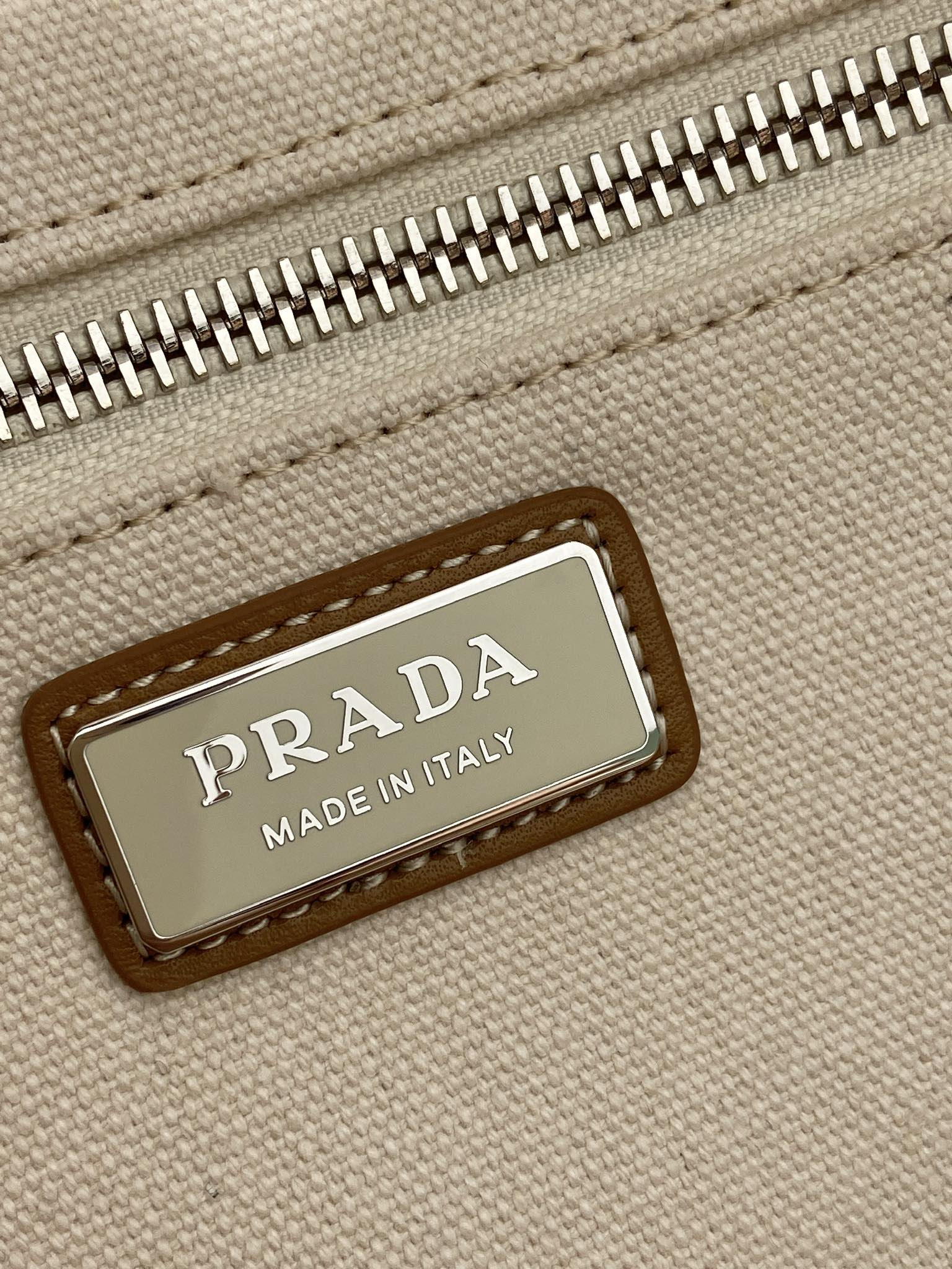 Prada Canvas Travel Bag with Leather Details - Spacious & Stylish 7 i1754633468 7632 8