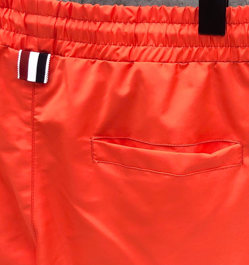 “THOM BROWNE Classic Four-Bared Sandal Shorts in Gray, Tibetan Cyan, White, and Orange – Code 1-5” - 图片 4