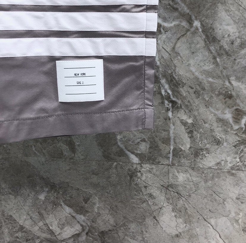 “THOM BROWNE Classic Four-Bared Sandal Shorts in Gray, Tibetan Cyan, White, and Orange” - 图片 7