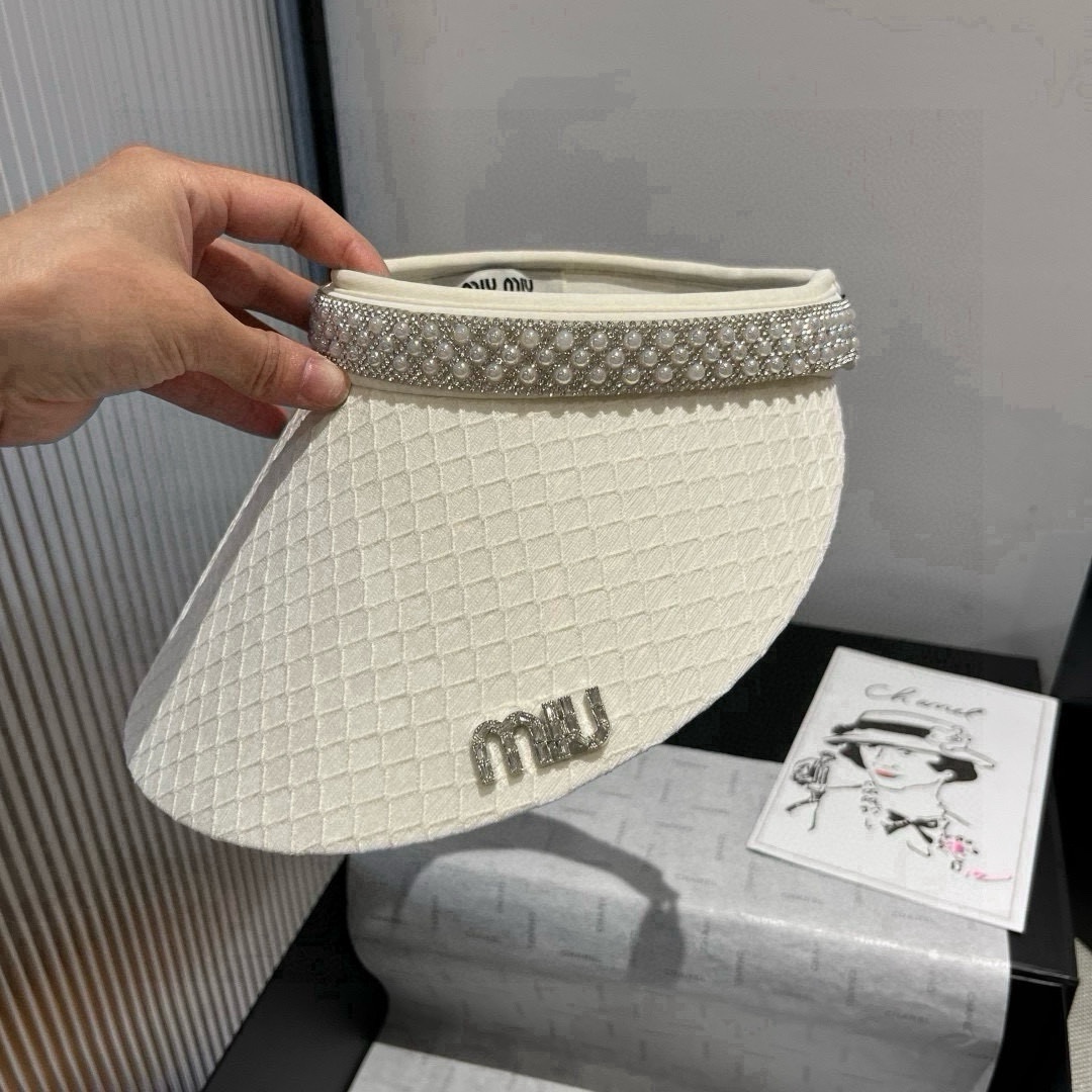 🆕

缪缪miumiu空顶发箍遮阳帽