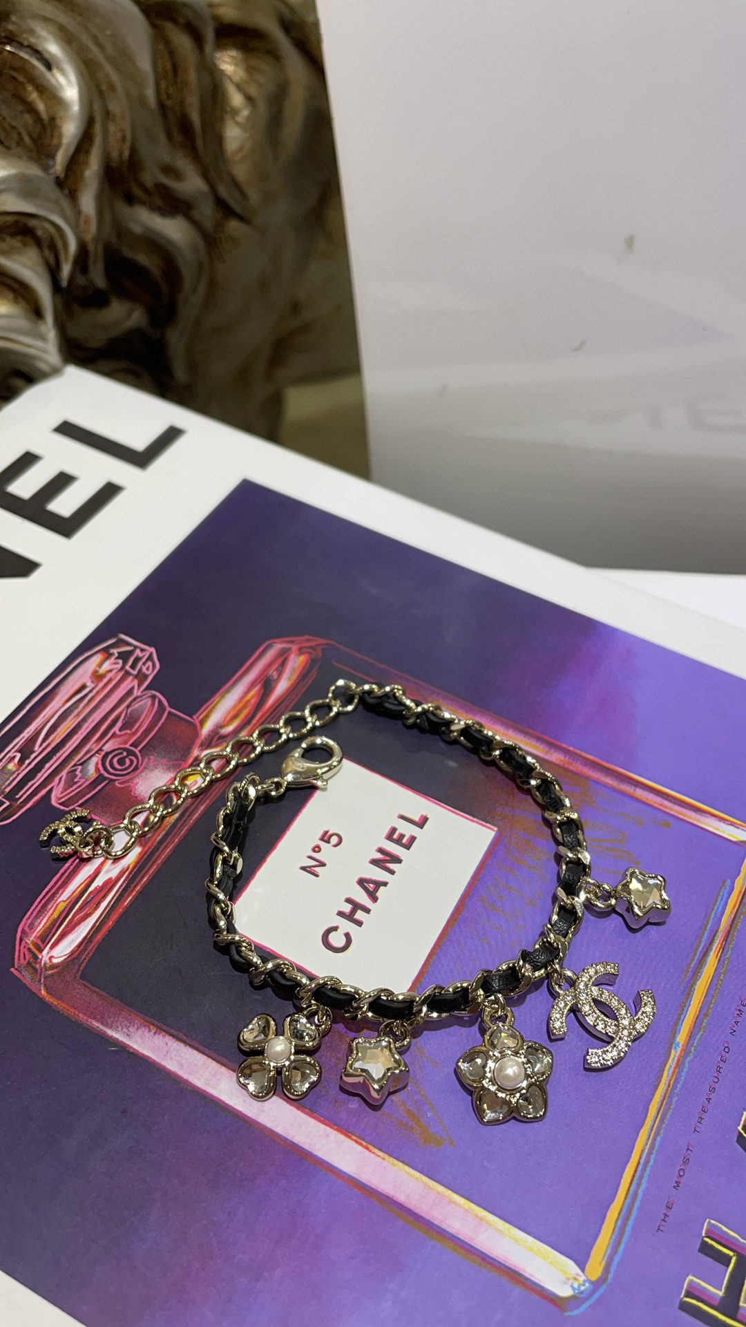 Chanel Gold Charm Bracelet with Leather and Crystal Accents 4 i1754898478 6829 2