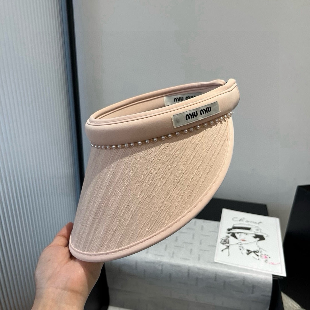 🆕

缪缪miumiu空顶发箍遮阳帽