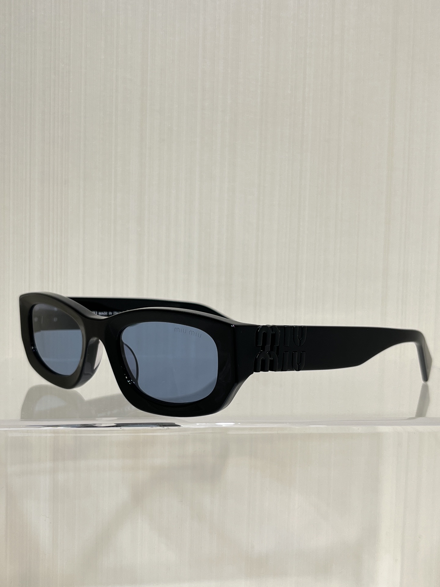 Miu Miu MU04UV Black Frame Blue Lens Fashion Sunglasses 2 i1755343802 9579 1