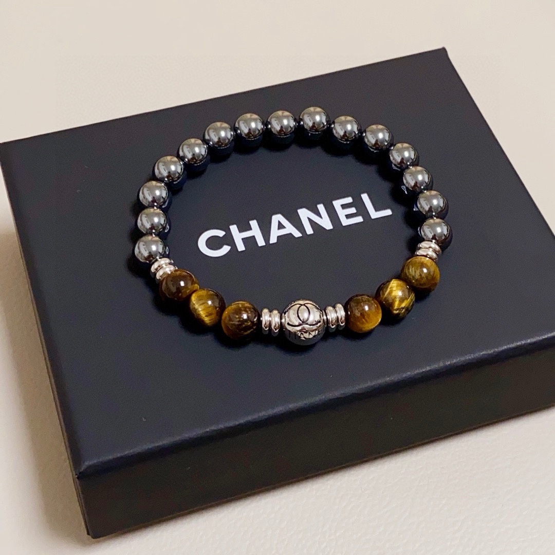 NO:378708,Chanel Chanel letter double C high-end natural tiger eye stone bracelet!  Natural black gallstone has health care functions and makes it look white and thick!  The classic and popular products of Thousand Years Amber and Ten Thousand Years of Beeswax are coming. The brand of Big Brand is absolutely omniscient among fashionable women. It is a well-known brand that is always popular when the years are shipped. It is a well-known brand that is synchronized with authentic molds. It has exclusive high-end quality and super good selling and sought-after neutral models for both men and women!  Elastic rope, jewelry quality, chanel, chanel, bracelet19860909香奈儿Chanel字母双C高级天然虎眼石手链！天然黑胆石具有保健功能显白厚实感十足！千年琥珀、万年蜜蜡经典火热爆款来袭大牌香奶奶这个品牌在时尚女性当中绝对无所不知都知道它的经典与岁月逢出货必火的一个知名品牌同步专柜正品开模独家高端品质超好卖超抢手中性款男女都可佩戴！有弹力绳,饰品精品,chanel,chanel,bracelet,Jewelry