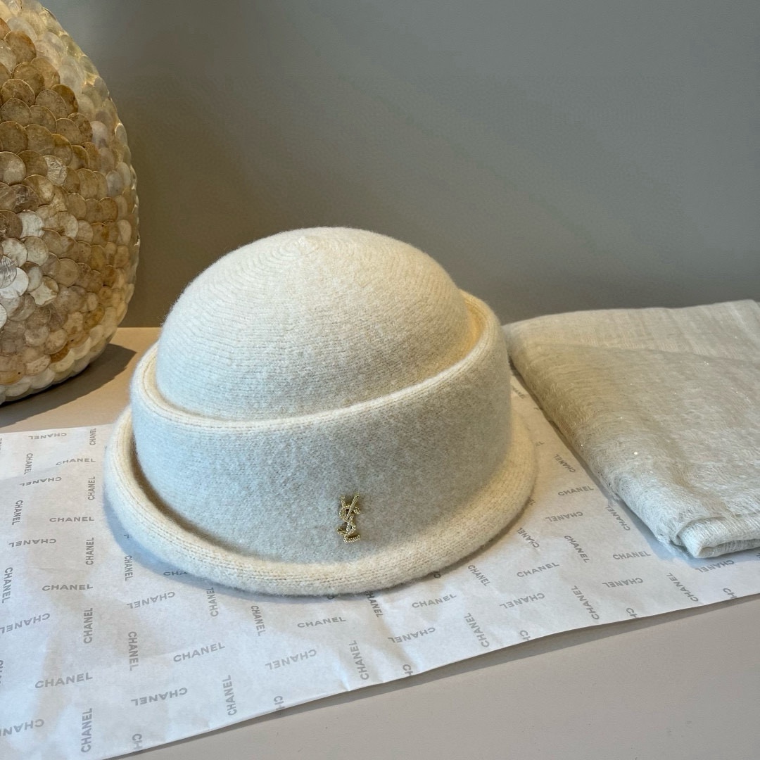 🆕

ysl圣罗兰新款羊毛卷边盆帽，不规则剪裁设计，头围57cm
