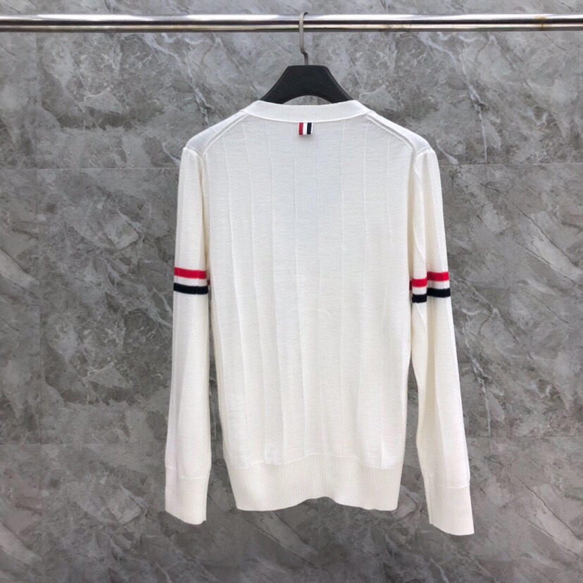 THOM BROWNE 汤姆布朗 TB反底坑条双袖红白蓝羊毛开衫，男女同款情侣款 \n码数：1-4 颜色