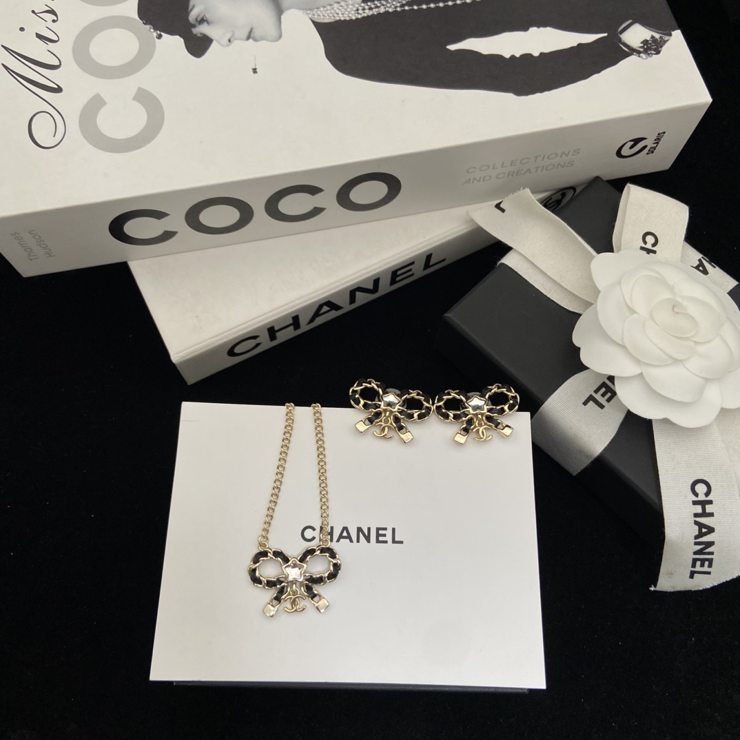 CHANEL ожерелье бант двойная C звезда