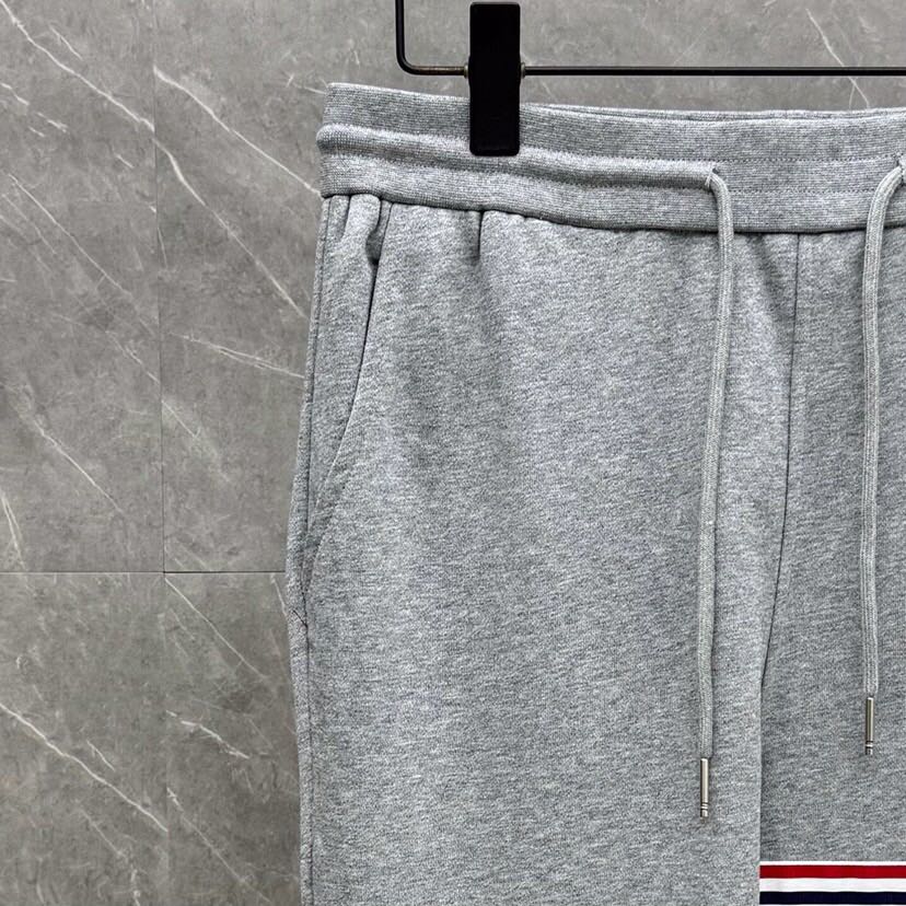 THOM BROWNE 汤姆布朗 TB新季红白蓝四杠系列【卫裤】 男女同款情侣款休闲裤\n码数：1-5 