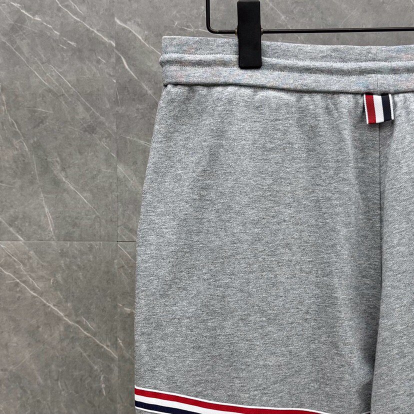 THOM BROWNE 汤姆布朗 TB新季红白蓝四杠系列【卫裤】 男女同款情侣款休闲裤\n码数：1-5 