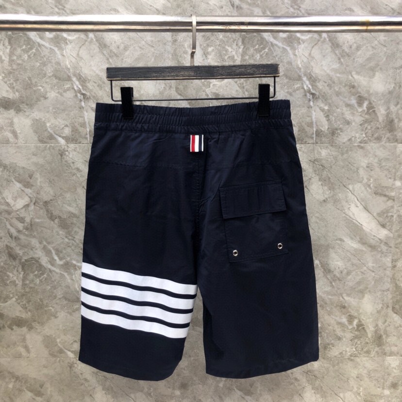 THOM BROWNE 汤姆布朗 TB四杠抽绳沙滩短裤 \n\n码数：1-4 颜色：灰、蓝、白（下单请报